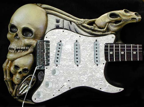 http://www.carverdoug.com/guitars/images/bone_strat.jpg